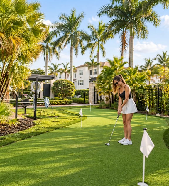 A woman is playing golf on a sunny day.