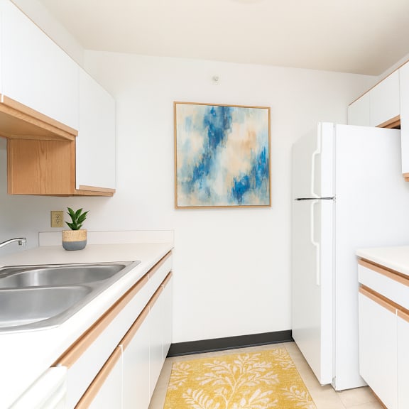 a bathroom with a sink and a toilet and a shower