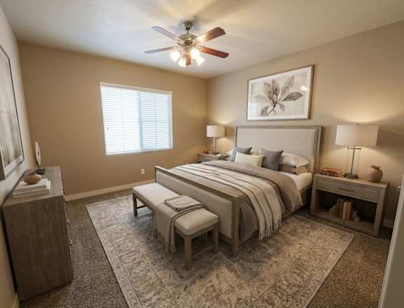 A bedroom with a large bed and a painting on the wall.