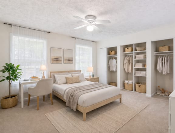 Bedroom with ceiling fan at Emerald Pointe, Riverdale, GA