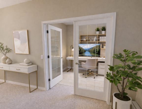 A room with a white door leading to a balcony with a table and chairs.