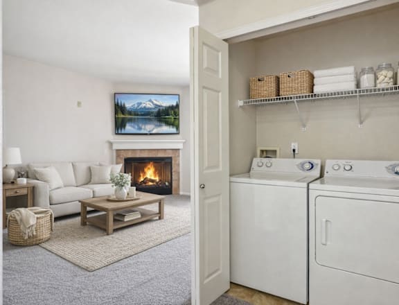 A laundry room with a washer and dryer in it.