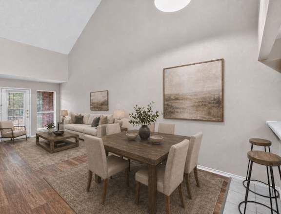 A dining room with a wooden table and chairs.
