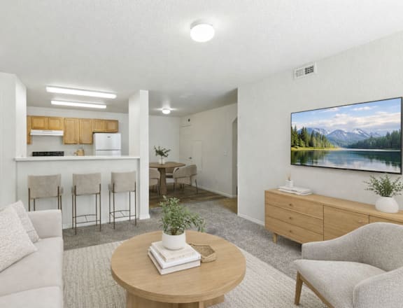 A living room with a couch, chairs, a coffee table, and a painting on the wall. at Diamond Fork Apartments, Utah, 84660