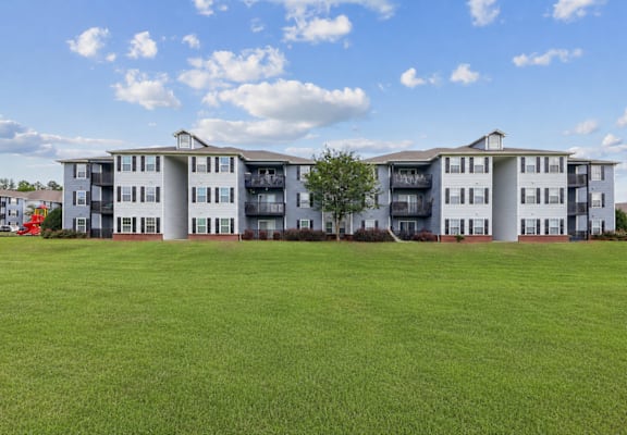 Apartment homes at Lancaster Place Apartments in Calera, Alabama surrounded by open green space in Shelby County near Birmingham.