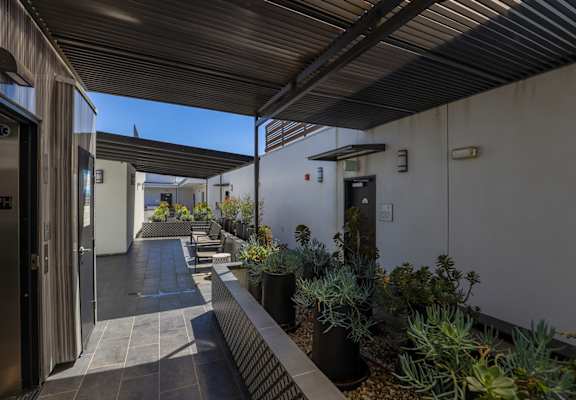 a view of the courtyard at the front of the building