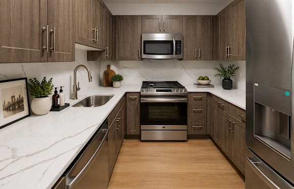 A modern kitchen with stainless steel appliances and wooden cabinets.