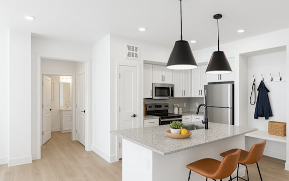 Modern apartment kitchen with open layout at Bluewood Kerrville