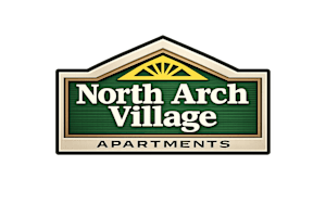 A sign for North Arch Village Apartments is surrounded by flowers.