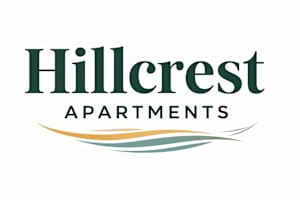 The image is a logo for Hillcrest Apartments.