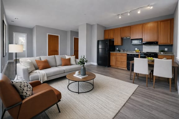 A modern living room with a white couch and a coffee table.