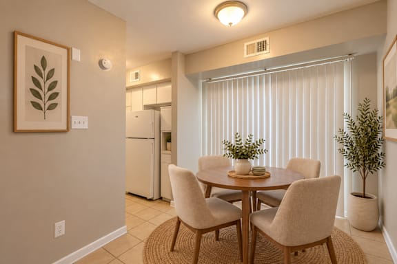 A dining room with a table and chairs at Lifestyle at Shreveport in Shreveport, LA, 71109.