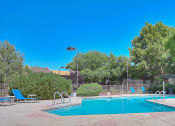 Thumbnail 1 of 9 - Resort-Style Pool at Eagle Point Apartments, NM, 87111