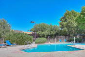 Thumbnail 1 of 9 - Resort-Style Pool at Eagle Point Apartments, NM, 87111