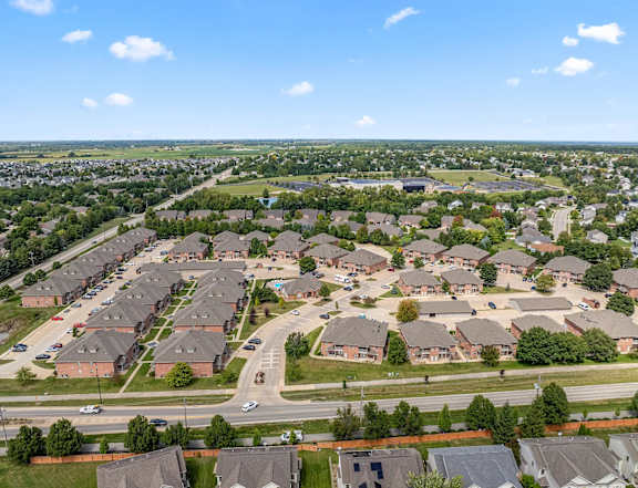 A suburban neighborhood with houses and streets.