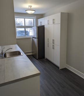 a kitchen with an island and a stove