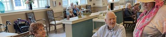 a group of people sitting at a table