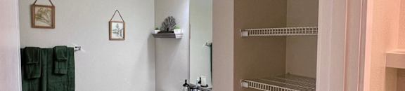 a bathroom with a sink and a toilet and a shower  at Mullan Reserve Apartments, Missoula, MT