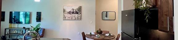 view of the kitchen and dining area from the living room  at Mullan Reserve Apartments, Missoula, Montana