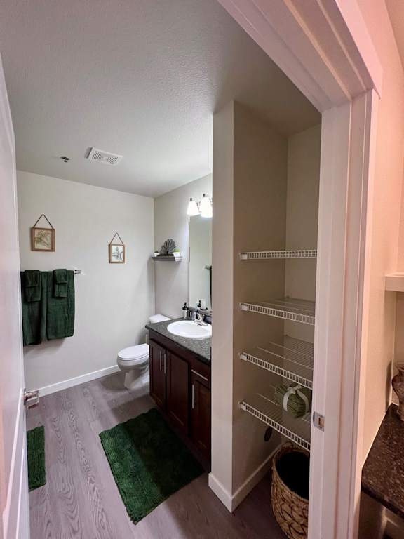 a bathroom with a sink and a toilet and a shower  at Mullan Reserve Apartments, Missoula, MT
