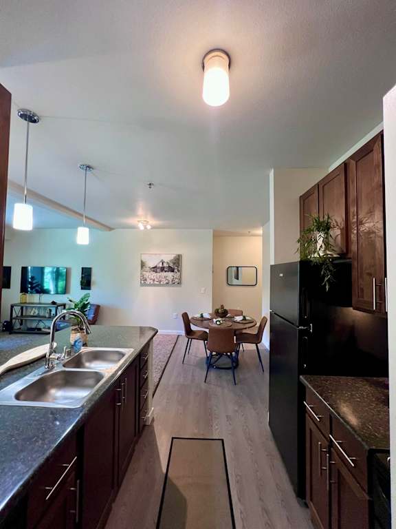 view of the kitchen and dining area from the living room  at Mullan Reserve Apartments, Missoula, Montana