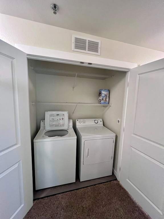 an empty laundry room with a washer and dryer  at Mullan Reserve Apartments, Missoula, 59808