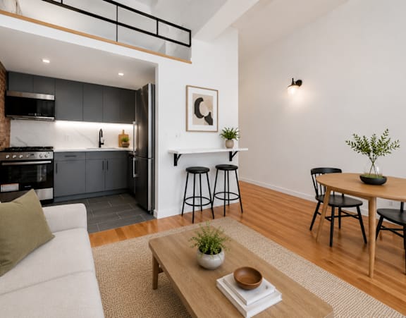 A kitchen with wooden cabinets and stainless steel appliances.