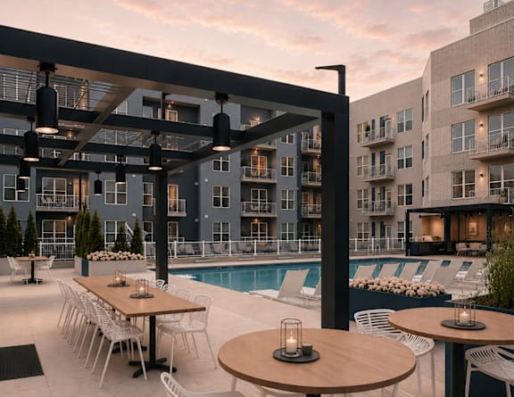 our resort style swimming pool is next to our building with lounge chairs