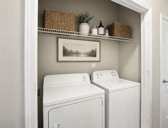 A laundry room with a washer and dryer.