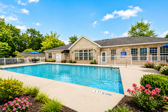 A pool with a 3 feet no diving sign.