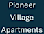 the white word pioneer villages apartments in white font on a blue background