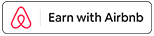 A sign that says "Earn with Airbnb" is displayed.