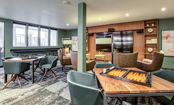 Community clubhouse game area at Circa Central Avenue in Phoenix, AZ
