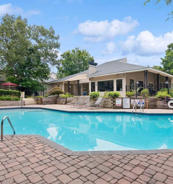 Community Swimming Pool with Pool Furniture at Park at Caterina Apartments located in Charlotte, NC-WELCOME.