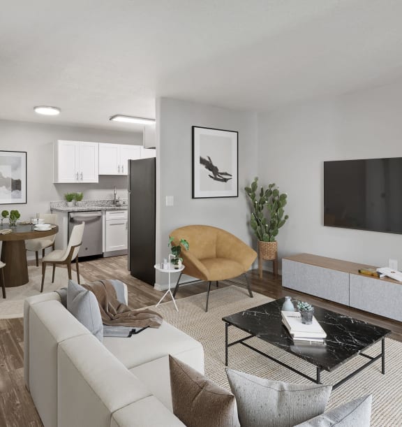 Model Living room with Wood-Style Flooring and View of Kitchen at Ridgeline Apartments in Tucson, AZ-WELCOME.