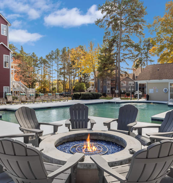 Outdoor Fire Pit Area with Lounge Furniture at Woodland Estates Apartments in Charlotte, NC-WELCOME.