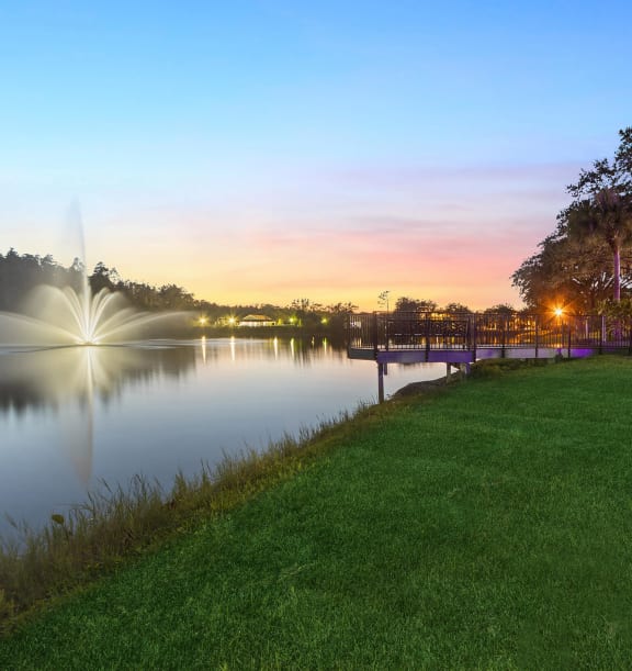 Community Pond and and Landscape at Vinings at Hunter's Green Apartments in Tampa, FL.