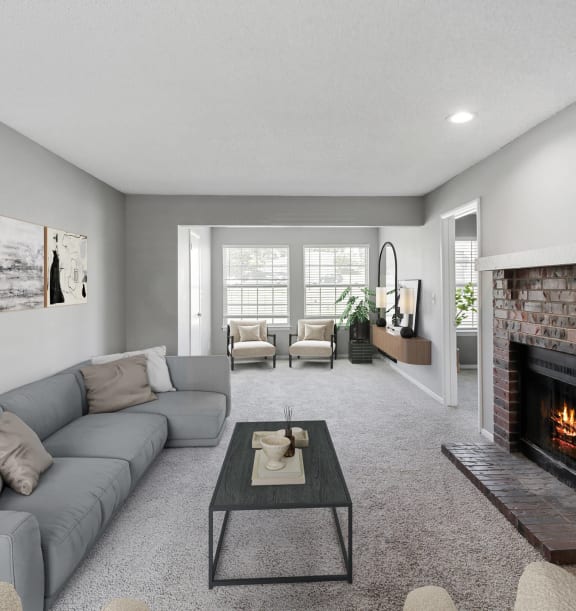 Model Living Room with Carpet and Fireplace at Abbington Heights Apartments in Antioch, TN-WELCOME.