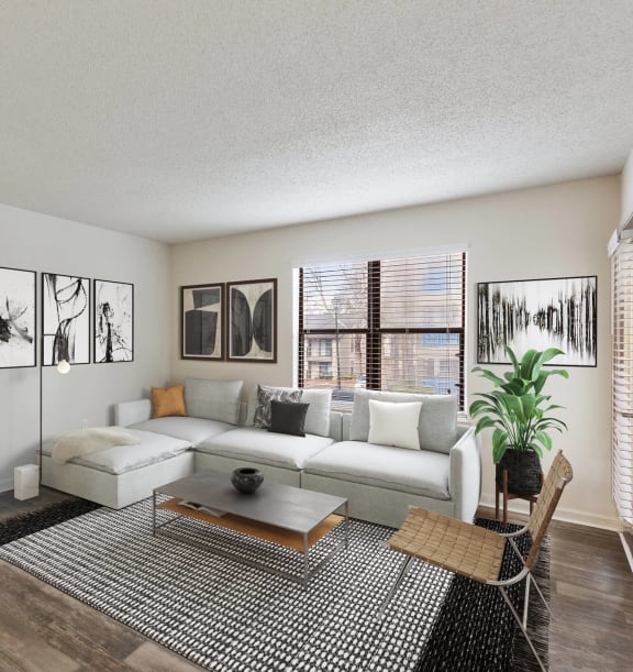 Model Living Room with Wood-Style Flooring at Grandstand Apartments in Marietta, GA-WELCOME.