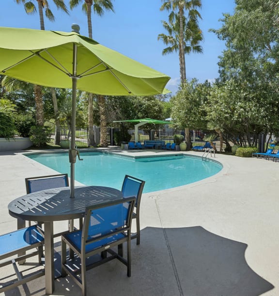 Community pool and table and chairs