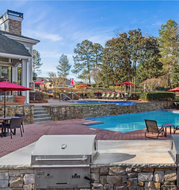 Community grills and pool at Waterford Place apartments
