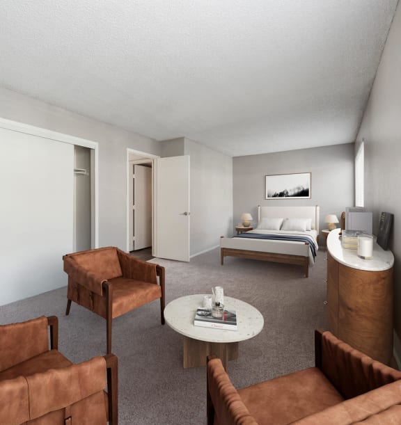 Model Bedroom with Carpet and Window View at Bridges at 9 Mile Station Apartments in Denver, CO-WELCOME.