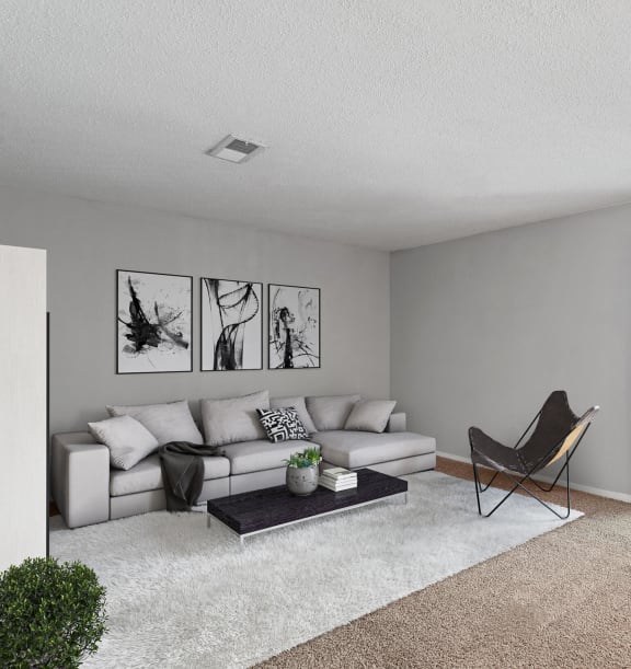 Model Living Room with Carpet and Patio Accessibility at Corners at 1700 Apartments in Atlanta, GA-WELCOME.