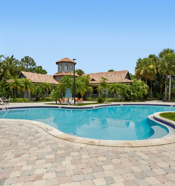 Swimming pool and sundeck at Veranda at Westchase Apartments in Tampa, Florida