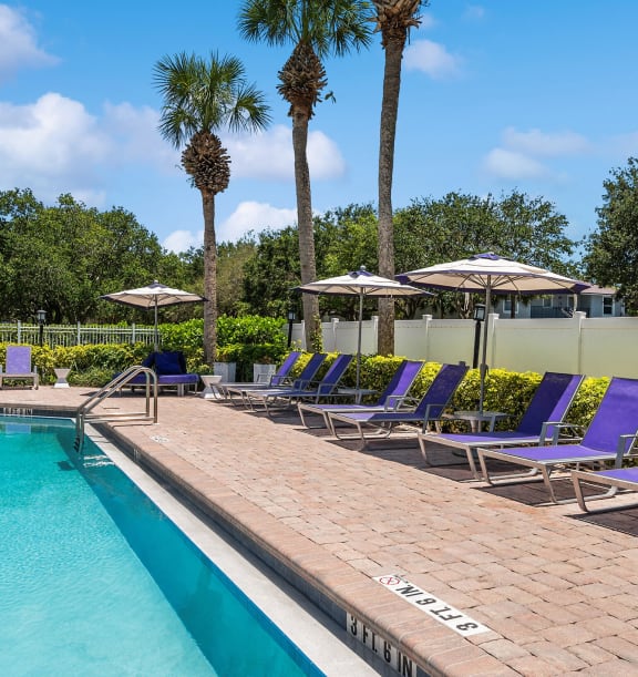 Swimming pool at Waverley Place Apartments in Naples, Florida