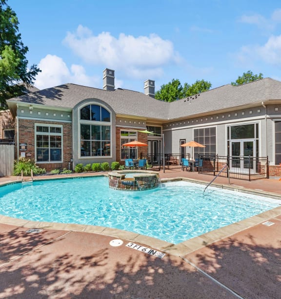 Swimming pool at The Belmont at Duck Creek Apartments in Garland, TX.