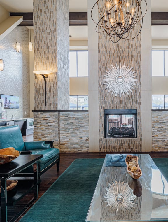 a living room with a couch and a fireplace