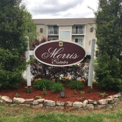 the sign in front of the murgis condominiums sign