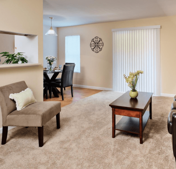 a bedroom with a bed and a ceiling fan
