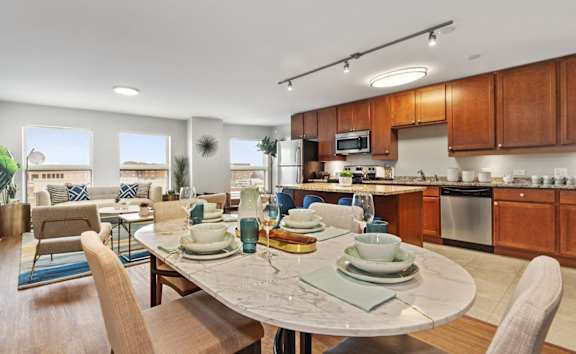 One- and two-bedroom apartment kitchen with breakfast bar and adjoining dining area